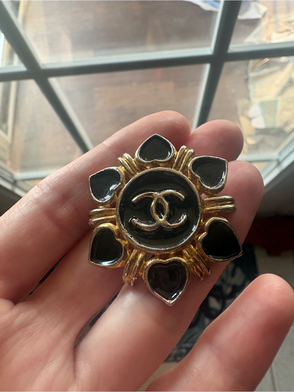 Gold and Black Sunburst CC Brooch